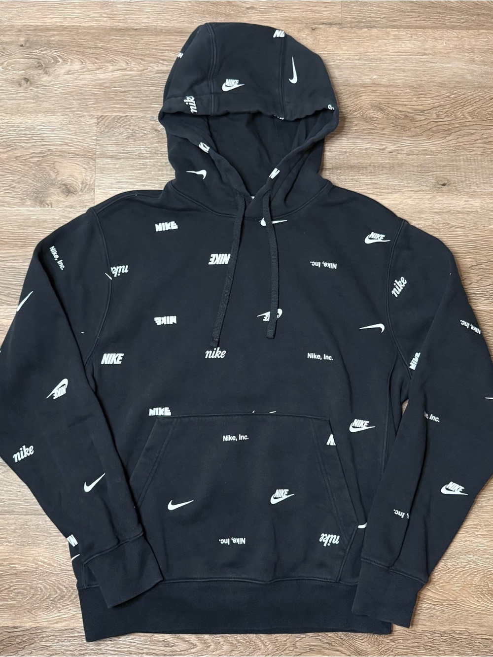 Nike Black Hoodie with Scattered White Logo Print